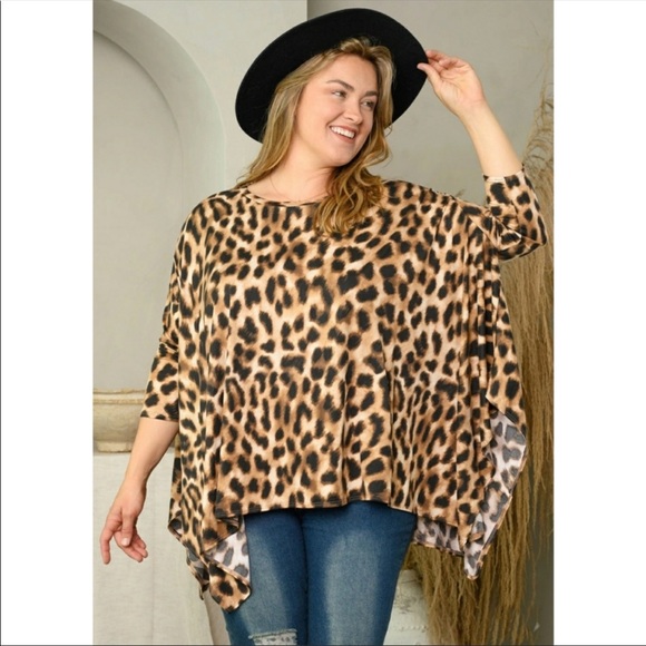 Private Label Tops - NWT PLUS SIZE (2X/3X) animal print asymmetrical top. VERY FLATTERING!!